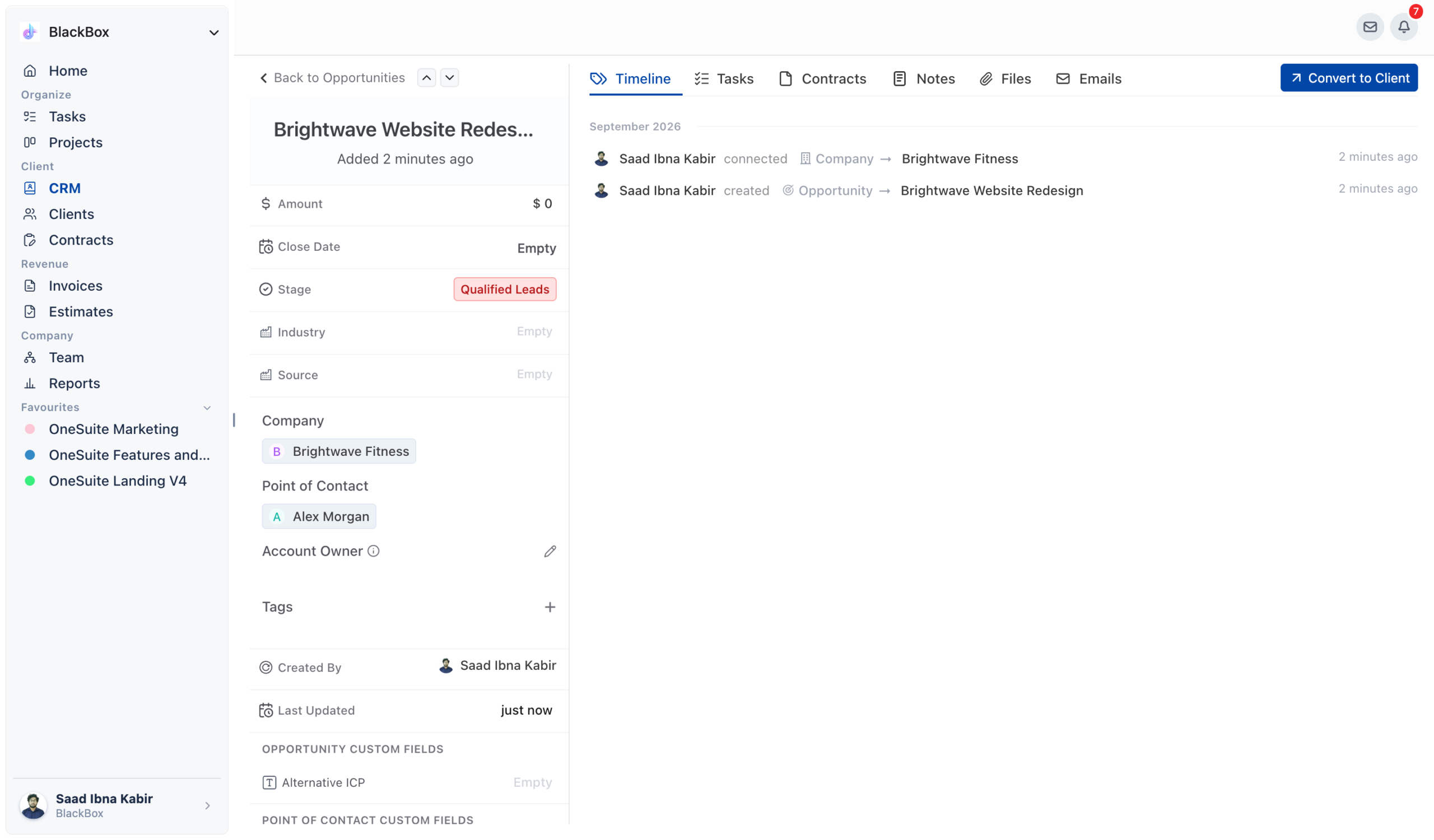 Opportunity detail page with the Company and Point of Contact sections and the Convert to Client button